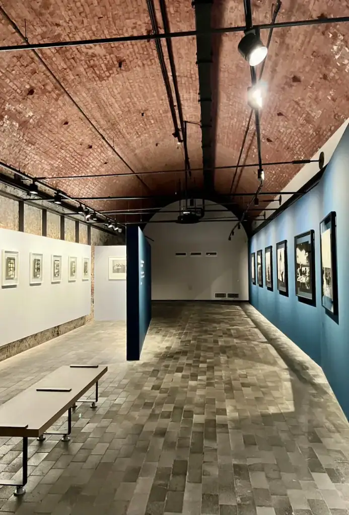 Minimalist photography gallery with an arched brick ceiling in Bomonti, one of Istanbul’s underrated cultural neighborhoods.