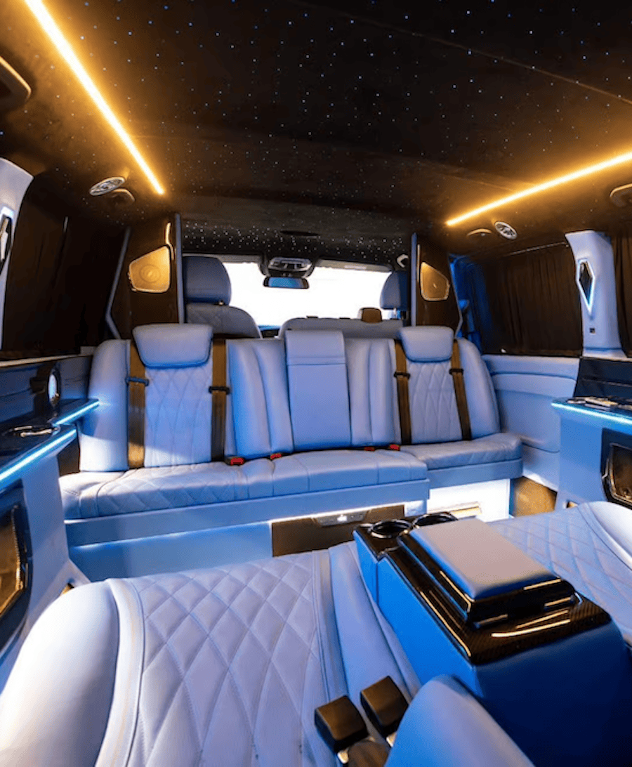 Luxury van interior with leather seats and ambient lighting representing private airport transfer options between Istanbul Airport and the city during a layover in Istanbul.